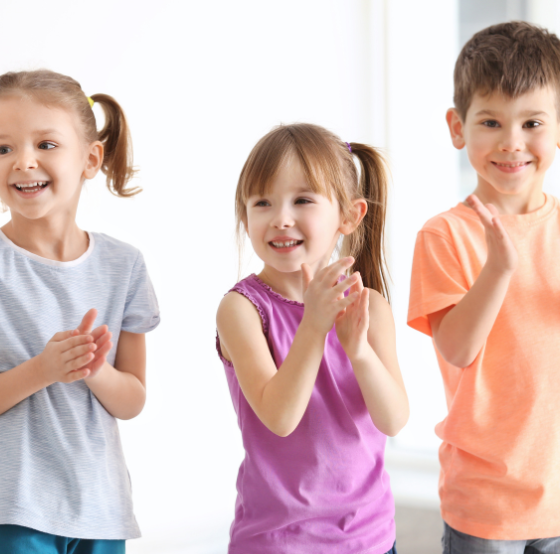 three children dancing